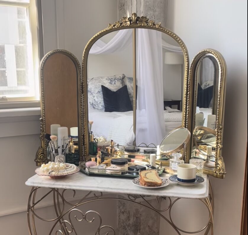 Vintage vanity with marble top and Anthropologie mirror